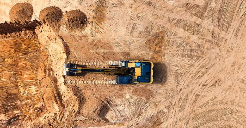 earthworks : techniques et méthodes pour la construction et l'aménagement du terrain, incluant le terrassement, le nivellement et la gestion des sols.
